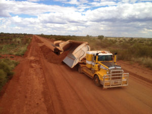 Equipment-Youngs-Earth-Moving-Equipment-Side-Tipper-Remote-Road-Sheeting
